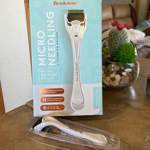 Brookstone Micro Needling Facial Massage Roller in White and Black